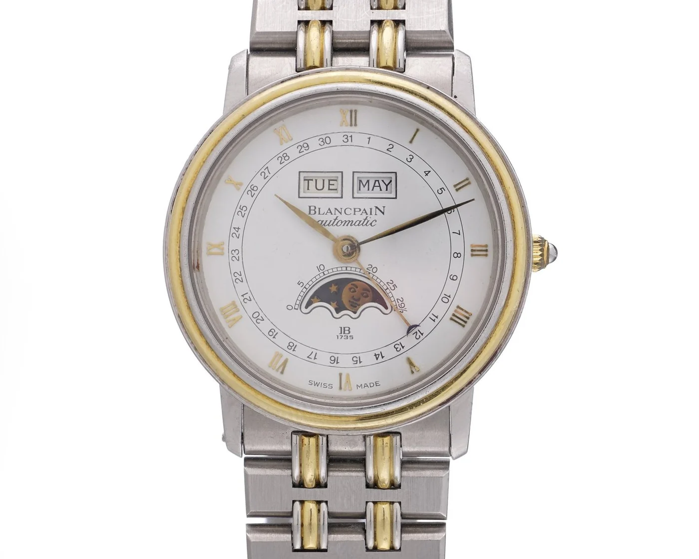 Blancpain Villeret triple calendar moonphase dial with day and month windows below 12, a pointer date around the edge and the moon at 6, the layout the Rolex Padellone revives