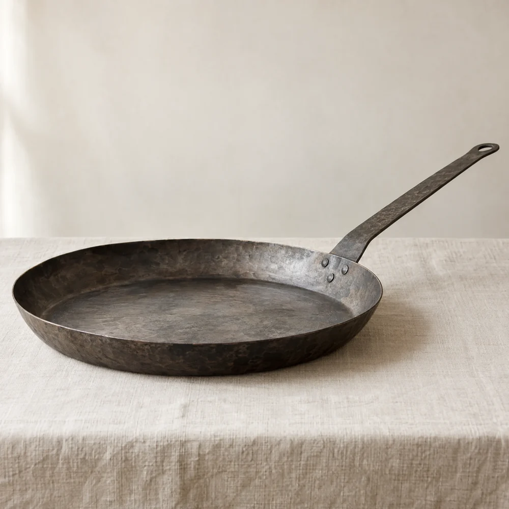 A large wide wrought iron Italian frying pan, the padella behind the Padellone nickname