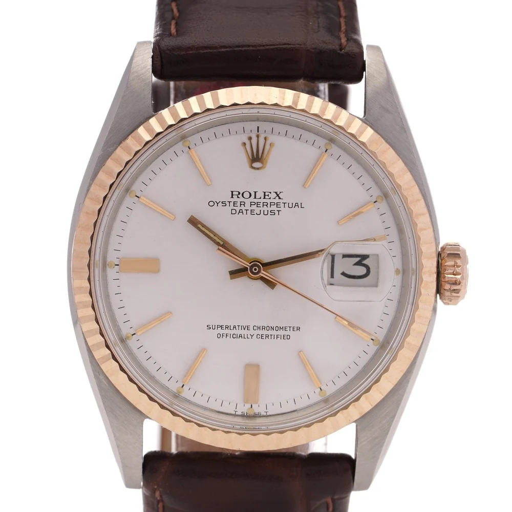 Rolex Oyster Perpetual Datejust reference 1601 with a fluted gold bezel and silvered dial