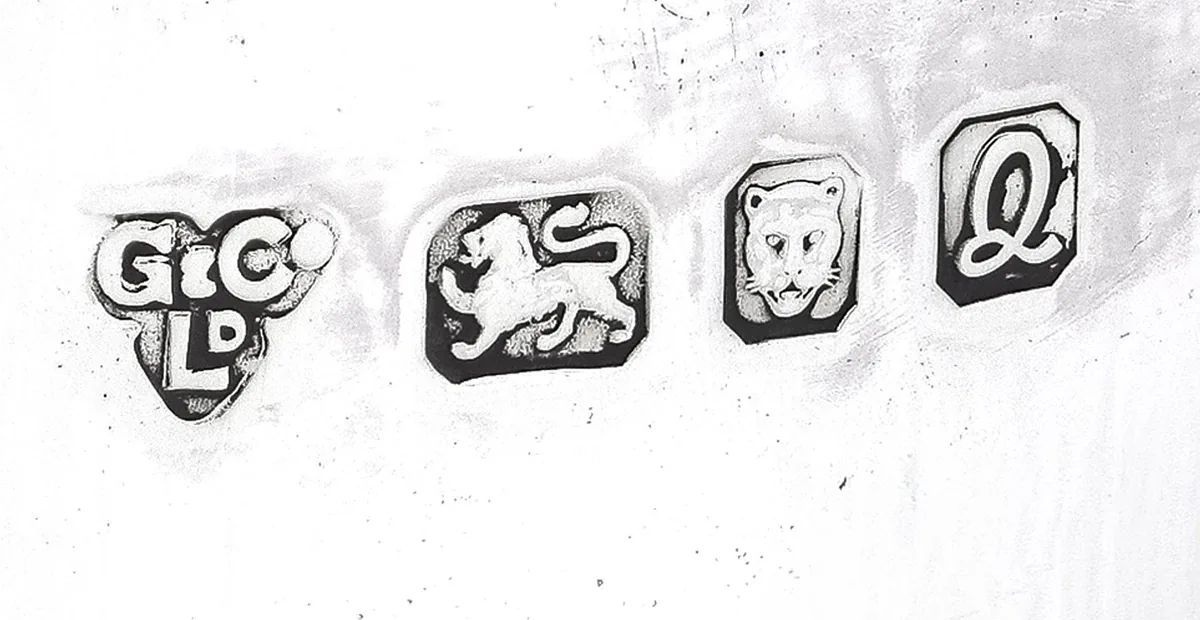Full British sterling silver hallmark: Garrard & Co sponsor's mark, lion passant, London leopard's head and date letter Q for 1990