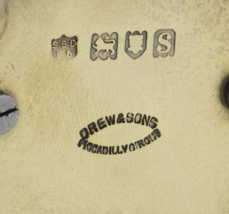 London 1913 silver hallmarks and the Drew & Sons Piccadilly Circus stamp on the base of a silver-gilt carriage clock
