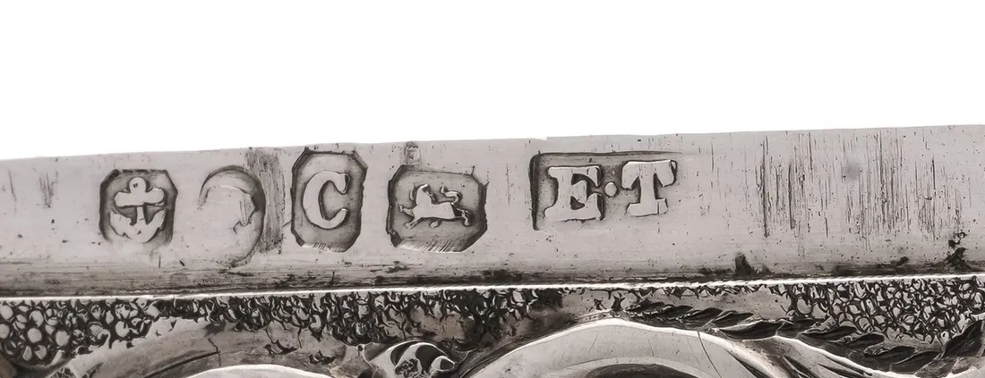 Birmingham hallmarks with the maker's mark ET for Edward Thomason along the edge of a Victorian silver card case