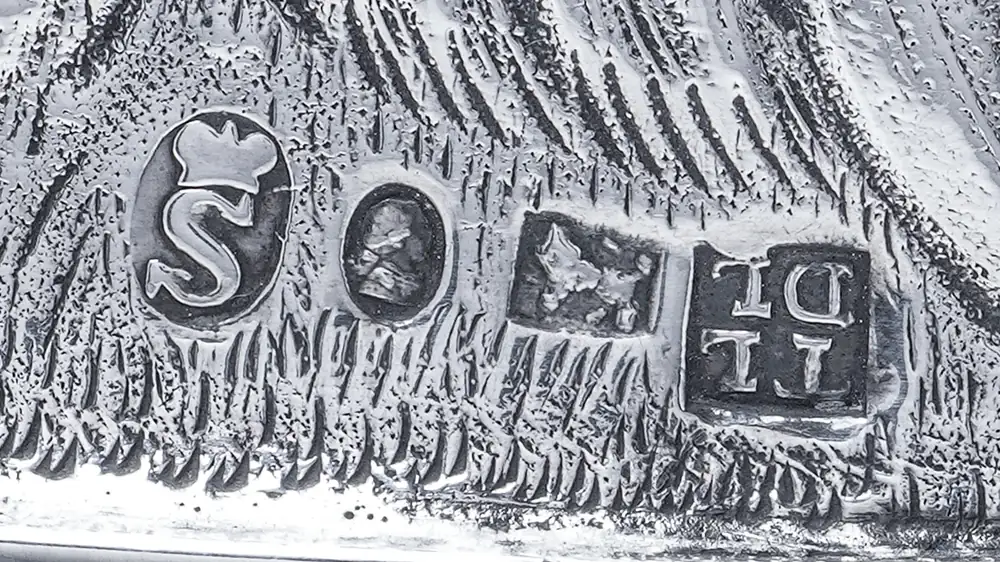 Sheffield hallmarks for 1807 on a George III silver stirrup cup, with the crown, date letter S and the head of George III