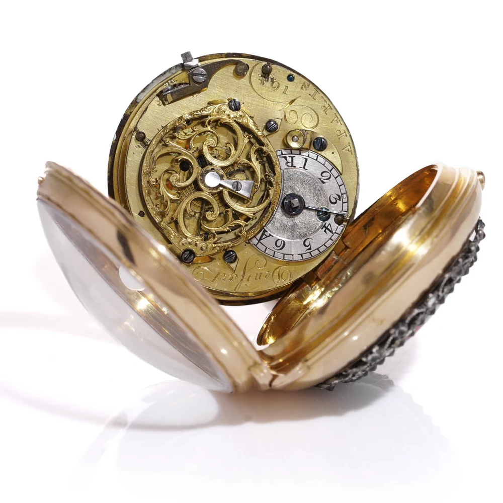 Continental verge pocket watch opened, the gilt movement hinged out of the gold case on its bezel