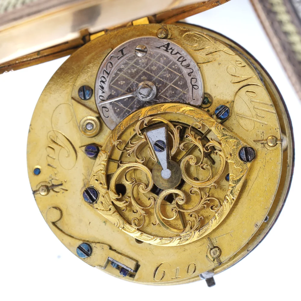 Gilt French verge movement with a silver regulator disc engraved Avance and Retard beside a pierced balance bridge