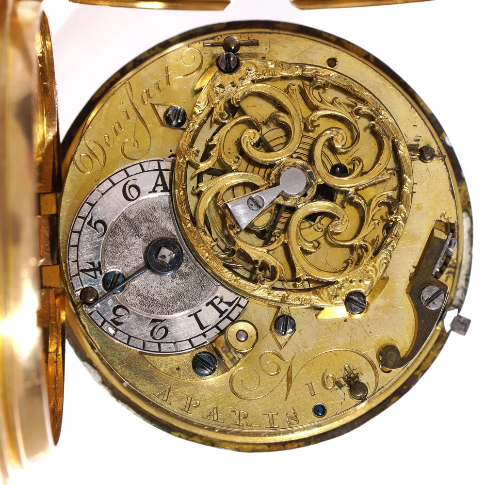 Gilt verge fusee movement signed Denisart a Paris, with a pierced and engraved balance bridge and a silver regulator disc marked A and R