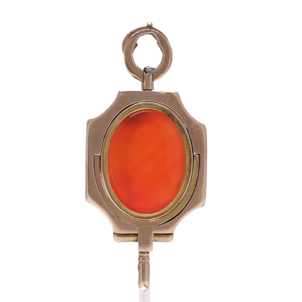 Victorian 9ct gold pocket watch key set with carnelian, the square socket at the base