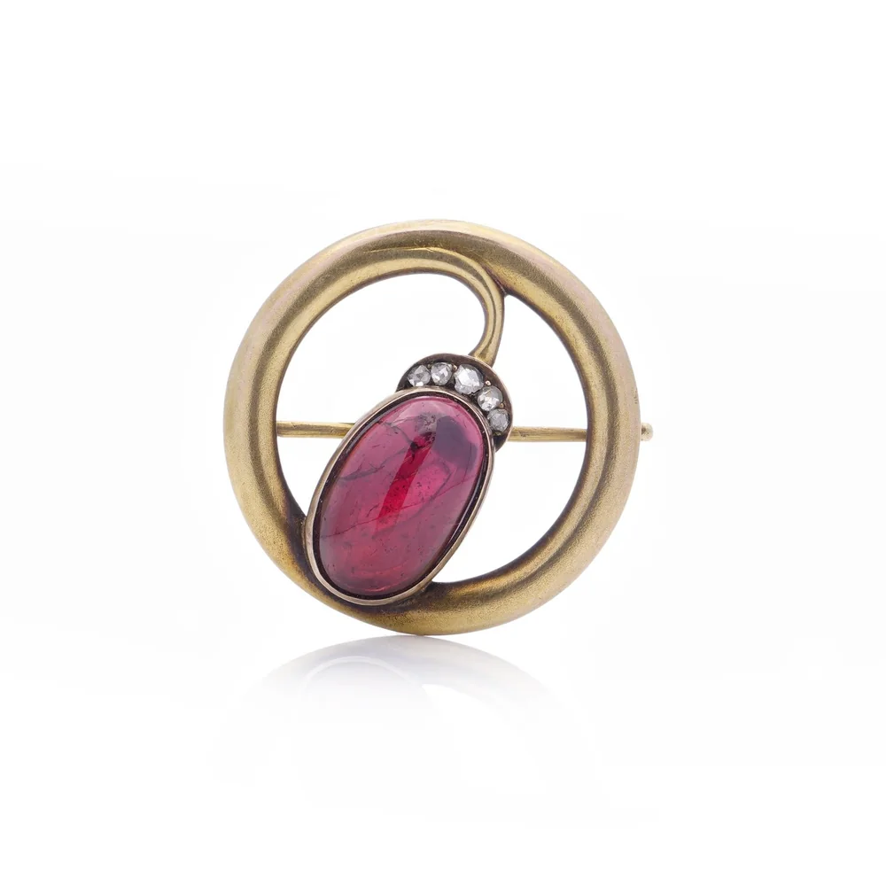 Karl Faberge 14KT gold brooch with an oval cabochon amethyst and diamonds