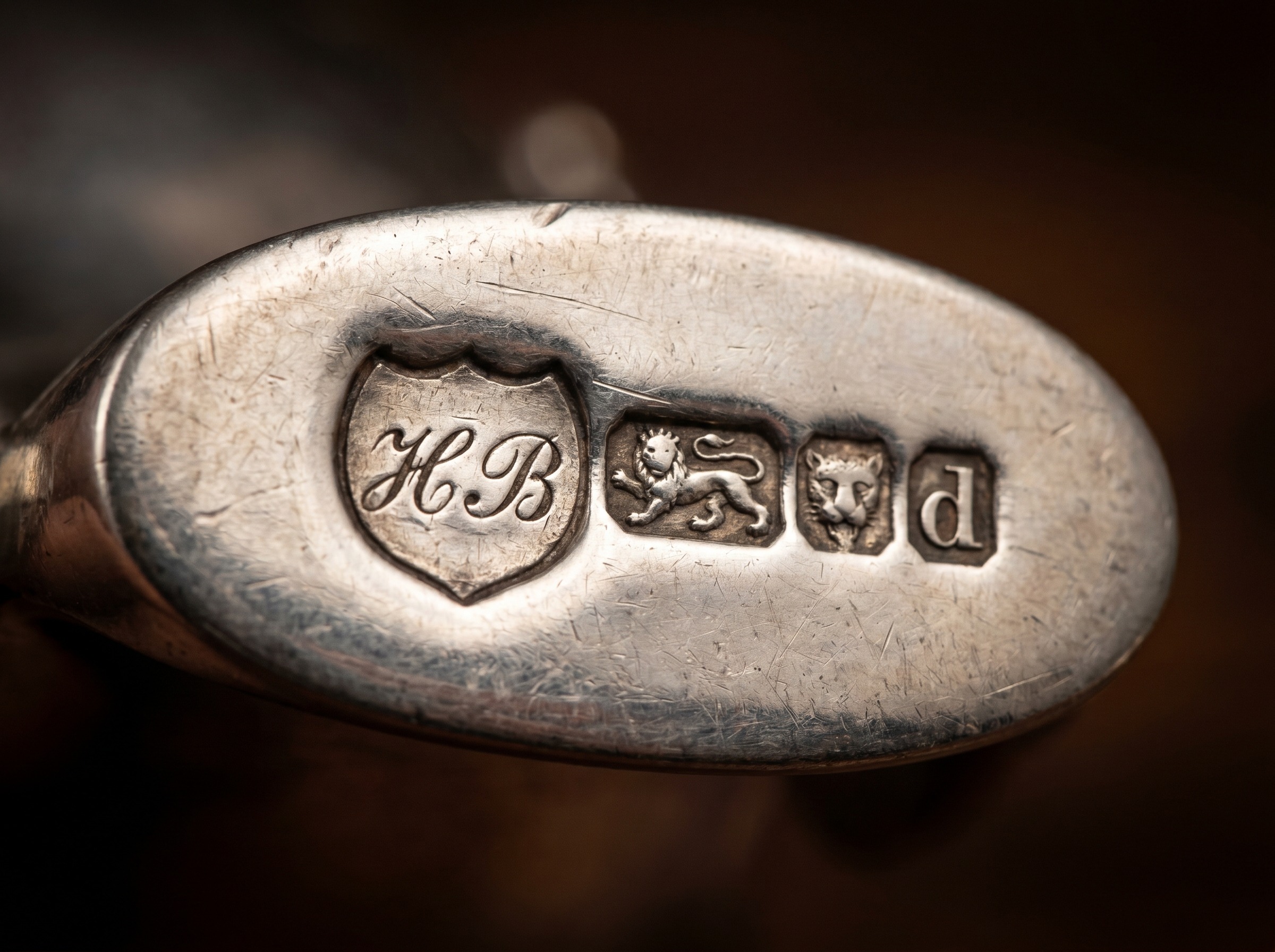 Hester Bateman HB cursive script maker's mark struck on Georgian sterling silver