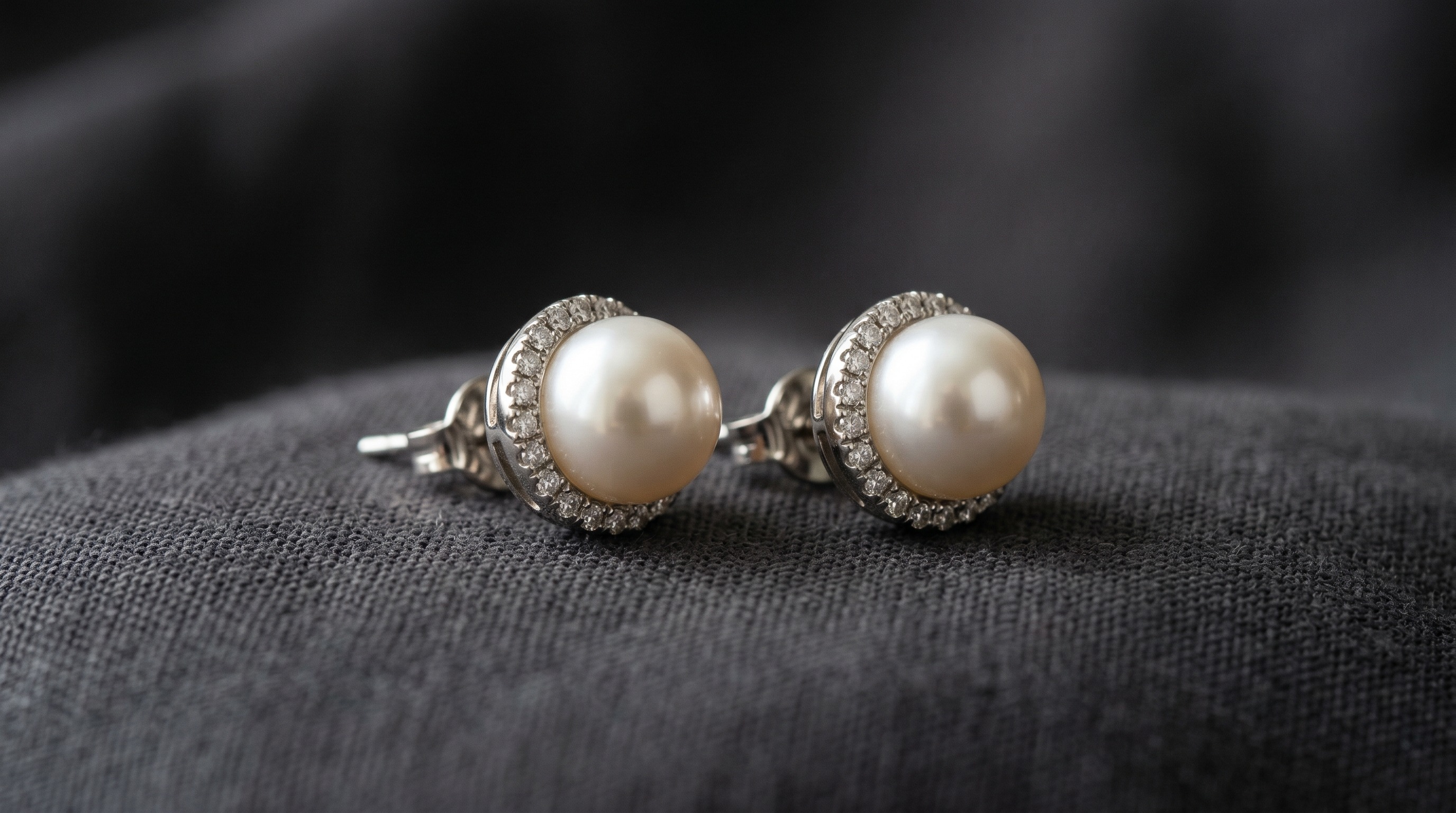 Mikimoto white pearl and diamond stud earrings in white gold