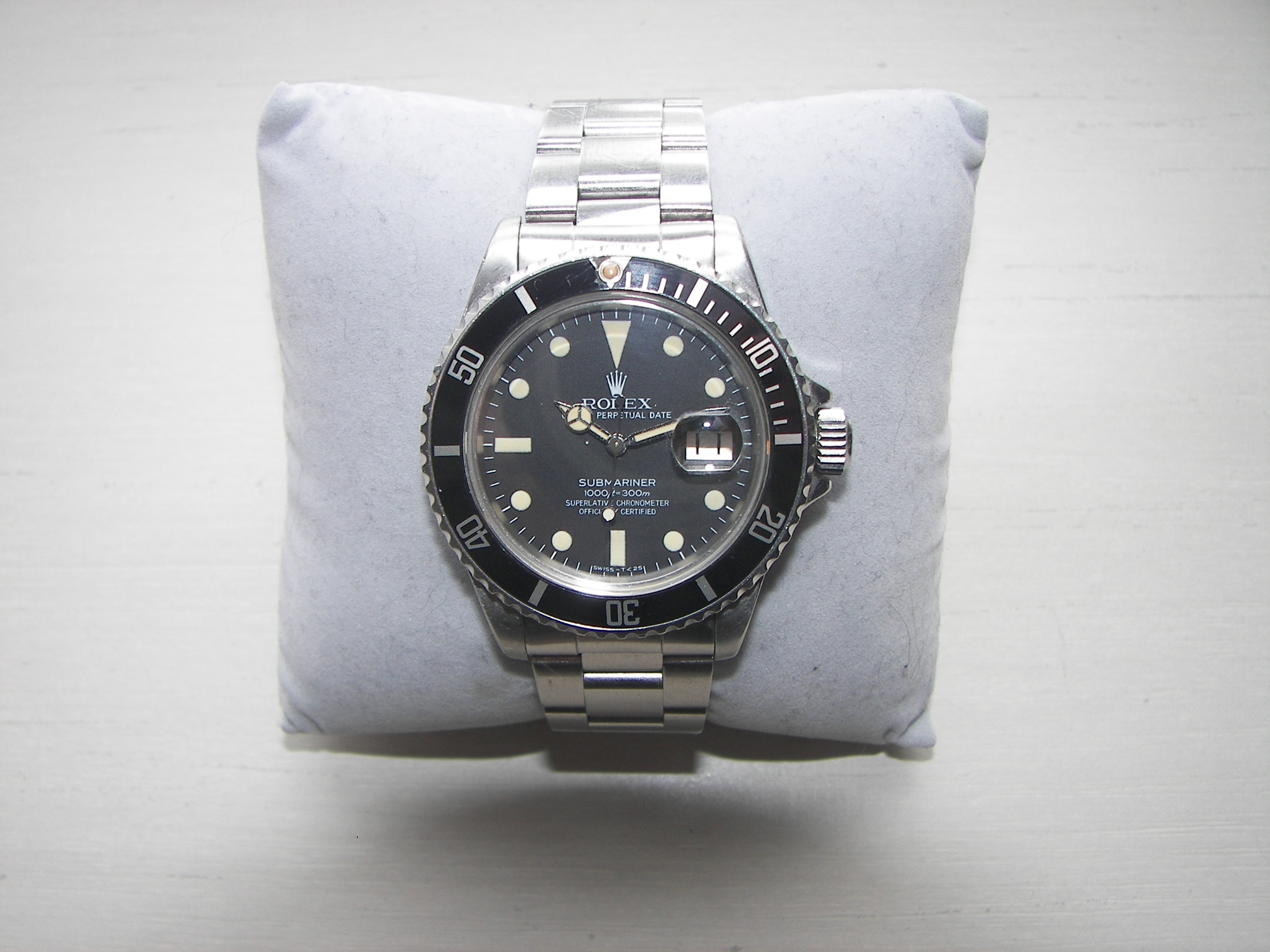 A pre-owned steel Rolex Submariner Date