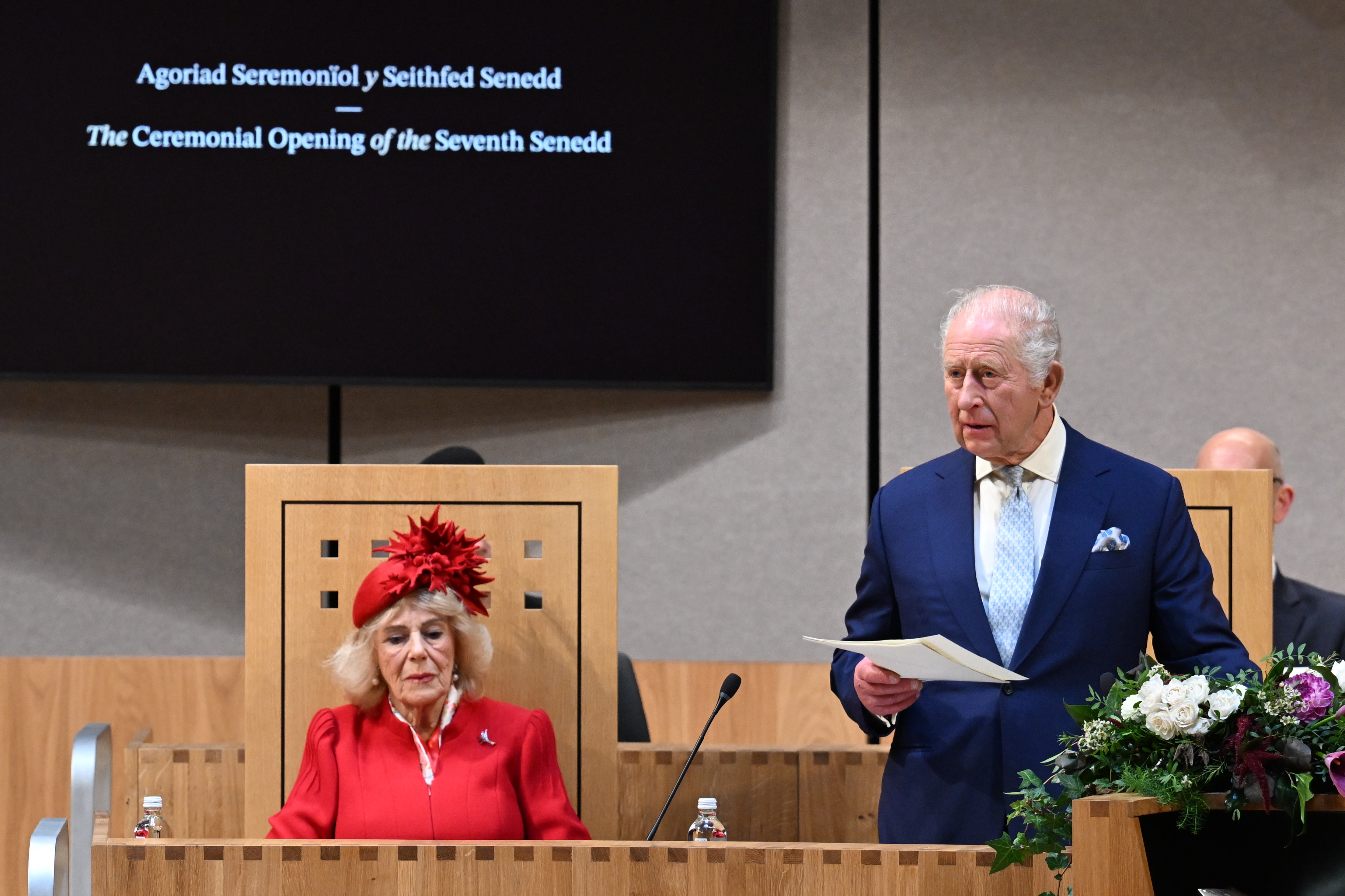 Queen Camilla wearing her diamond leek brooch beside the King at the ceremonial opening of the Seventh Senedd, Cardiff Bay, 15 October 2026