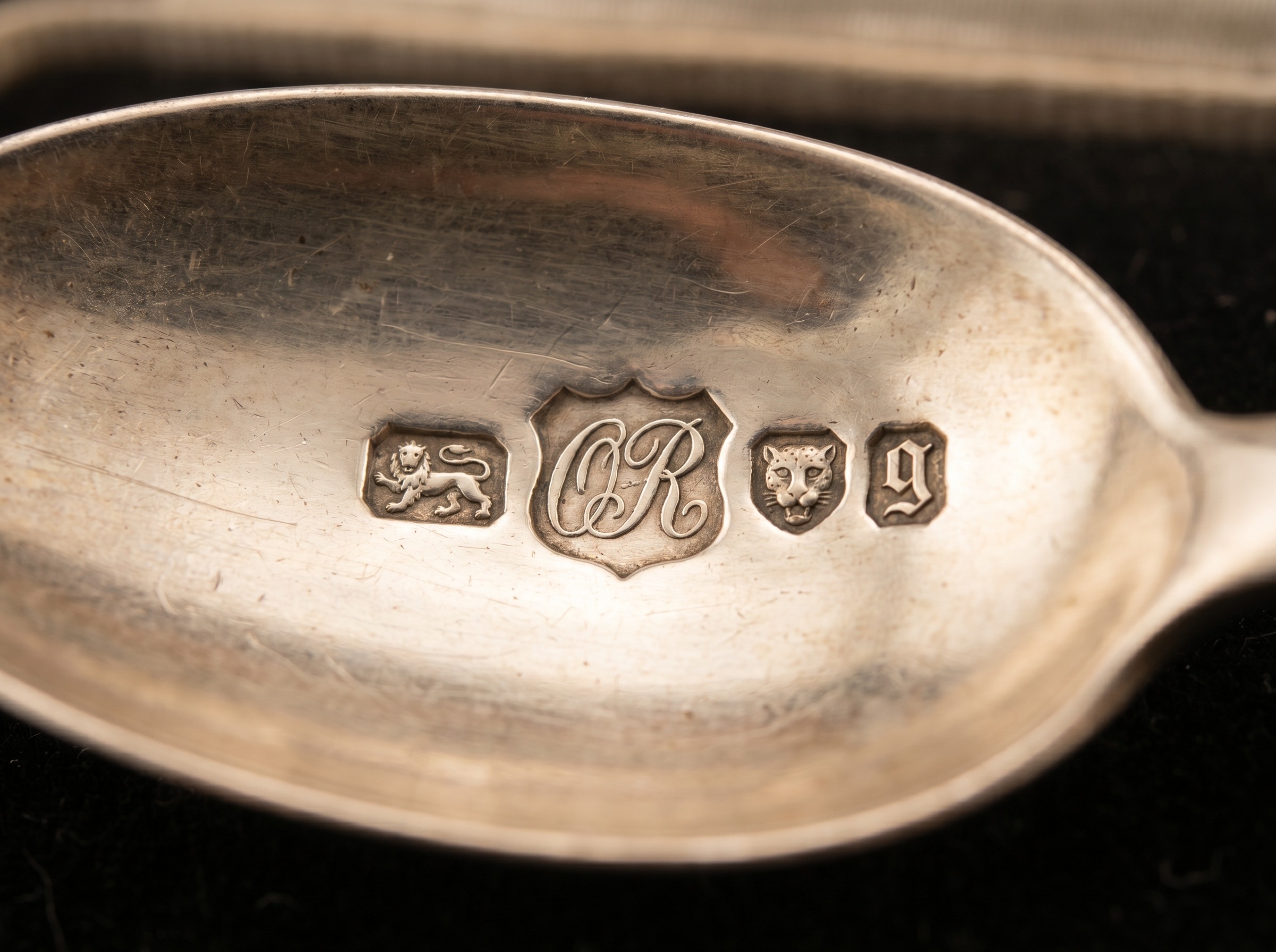 Omar Ramsden OR cursive maker's mark struck on Arts and Crafts sterling silver