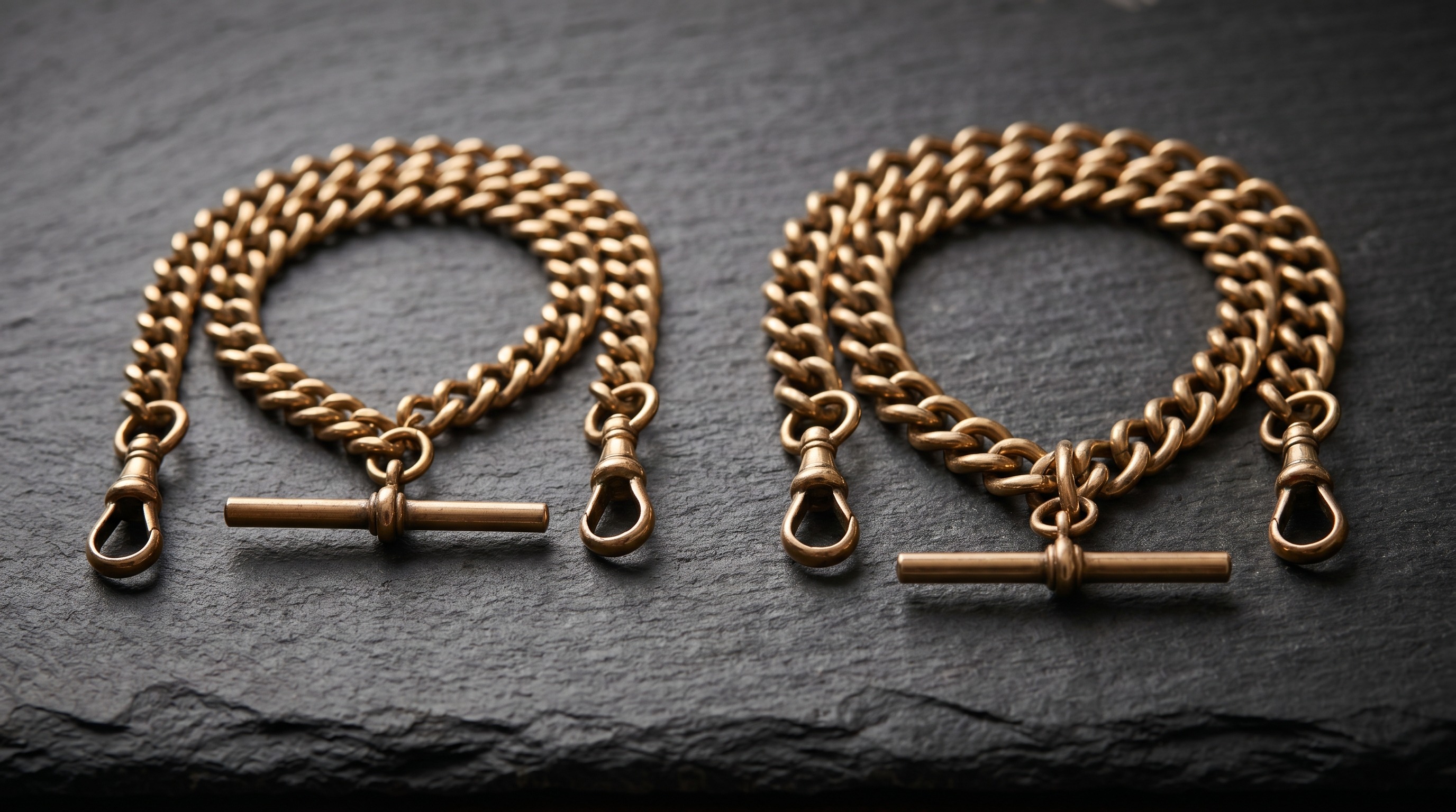 A single Albert chain beside a double Albert chain showing the T-bar and strand arrangement