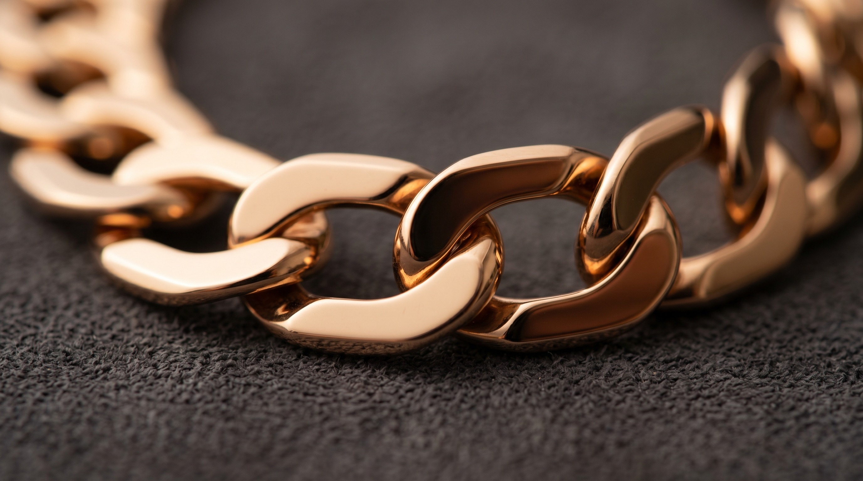 Close-up of Pomellato Iconica flat polished rose gold links