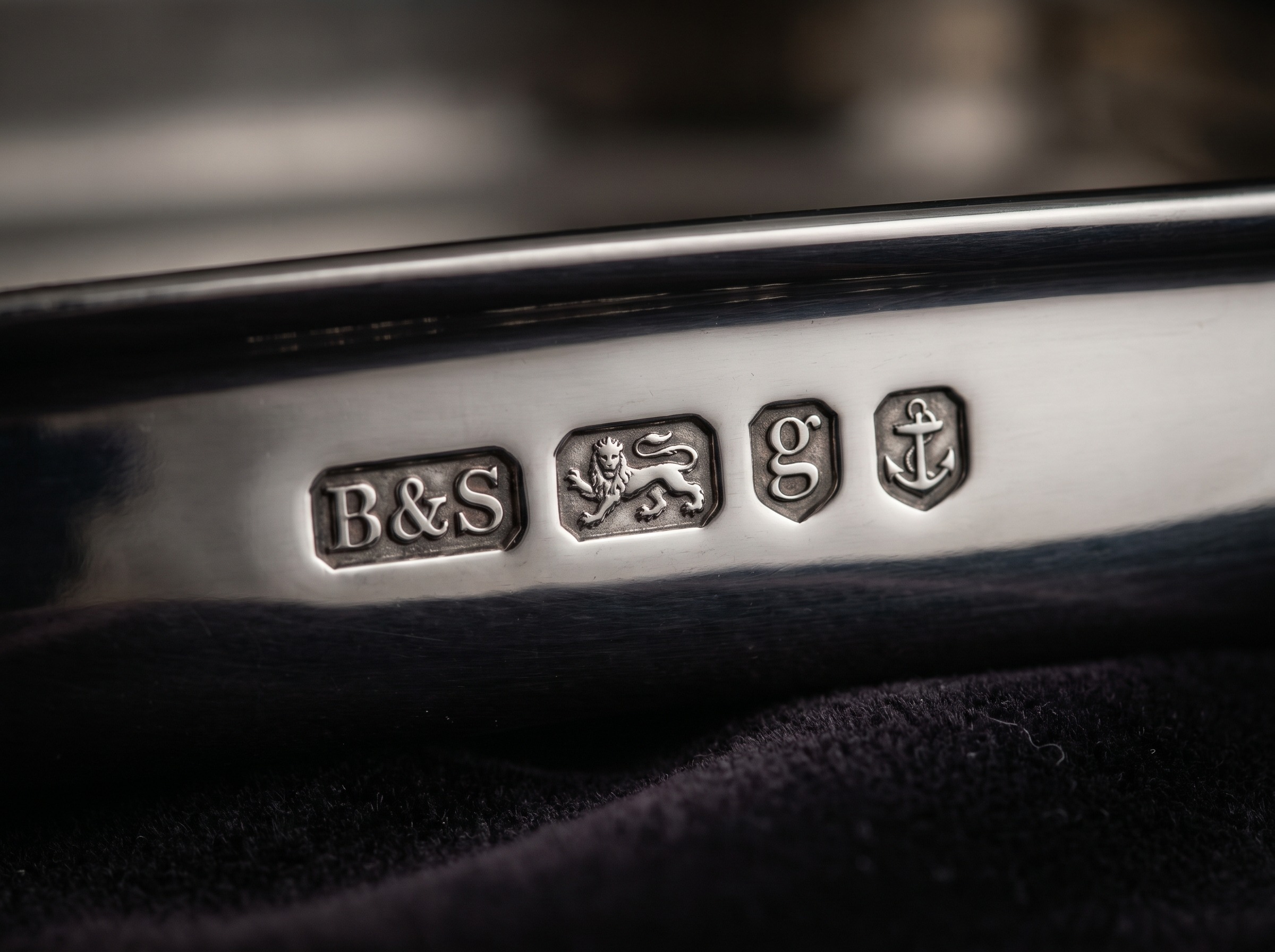 RW maker's mark and British hallmark on mid-century modern sterling silver by Robert Welch