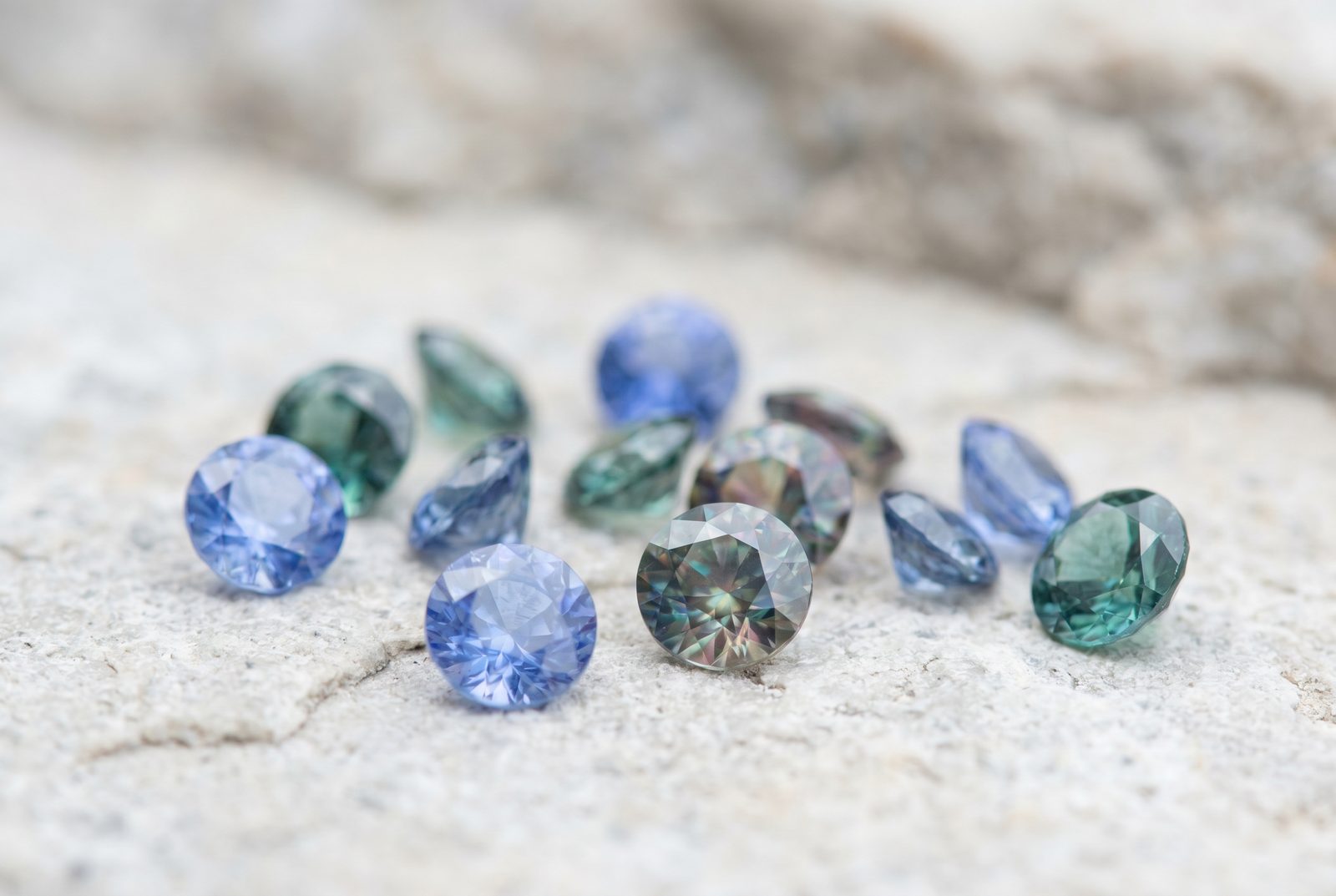 Sapphires in different colours — cornflower blue, teal and parti