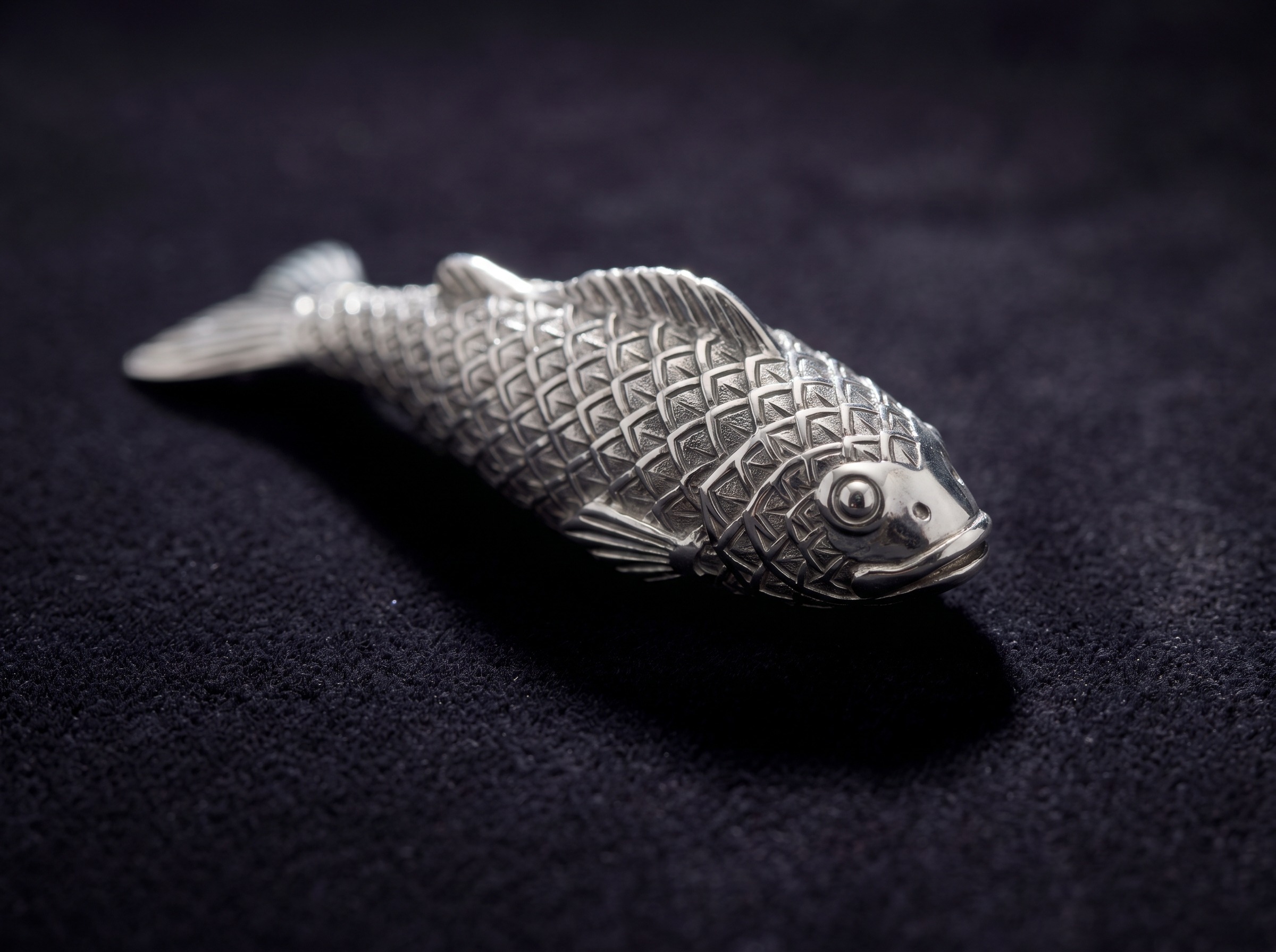 Frank Gehry for Tiffany Fish pendant in silver with geometric scaled surface