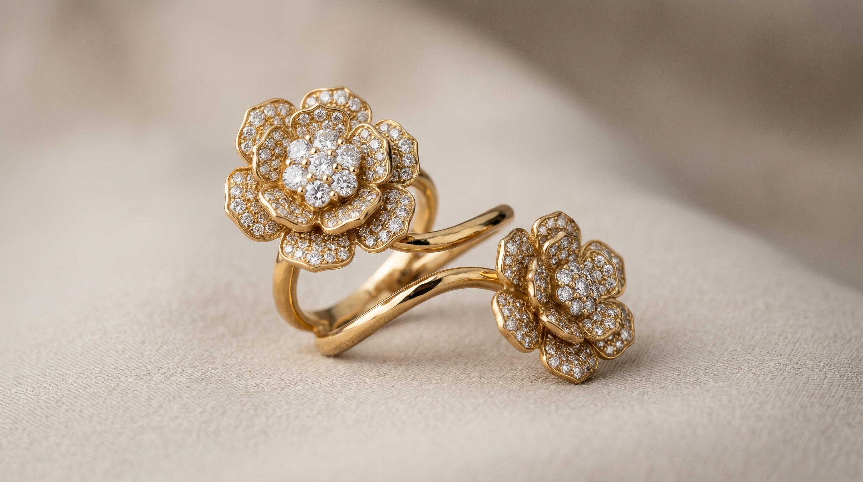 Van Cleef between-the-finger gold ring shown at an angle