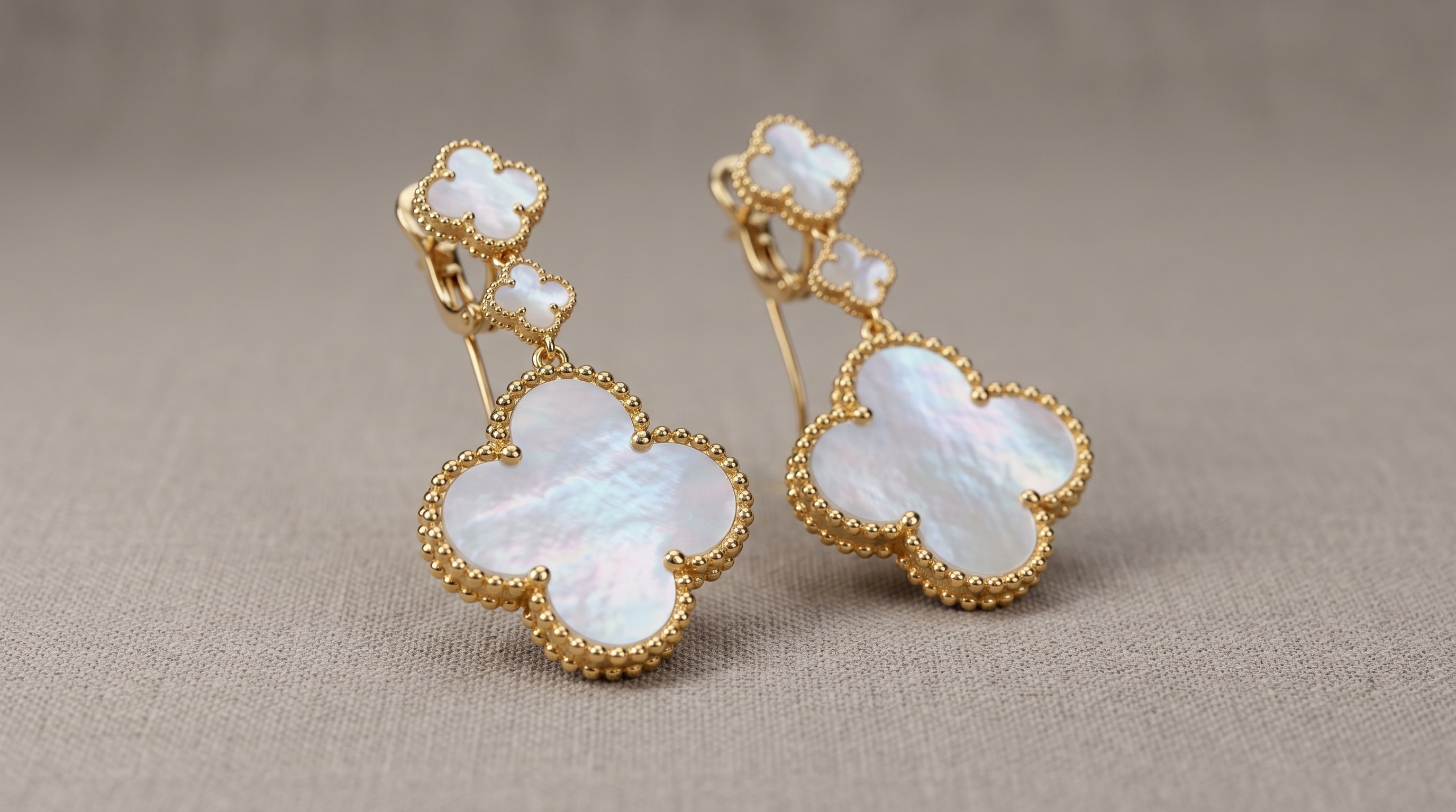 Van Cleef Magic Alhambra-style mixed-size clover earrings