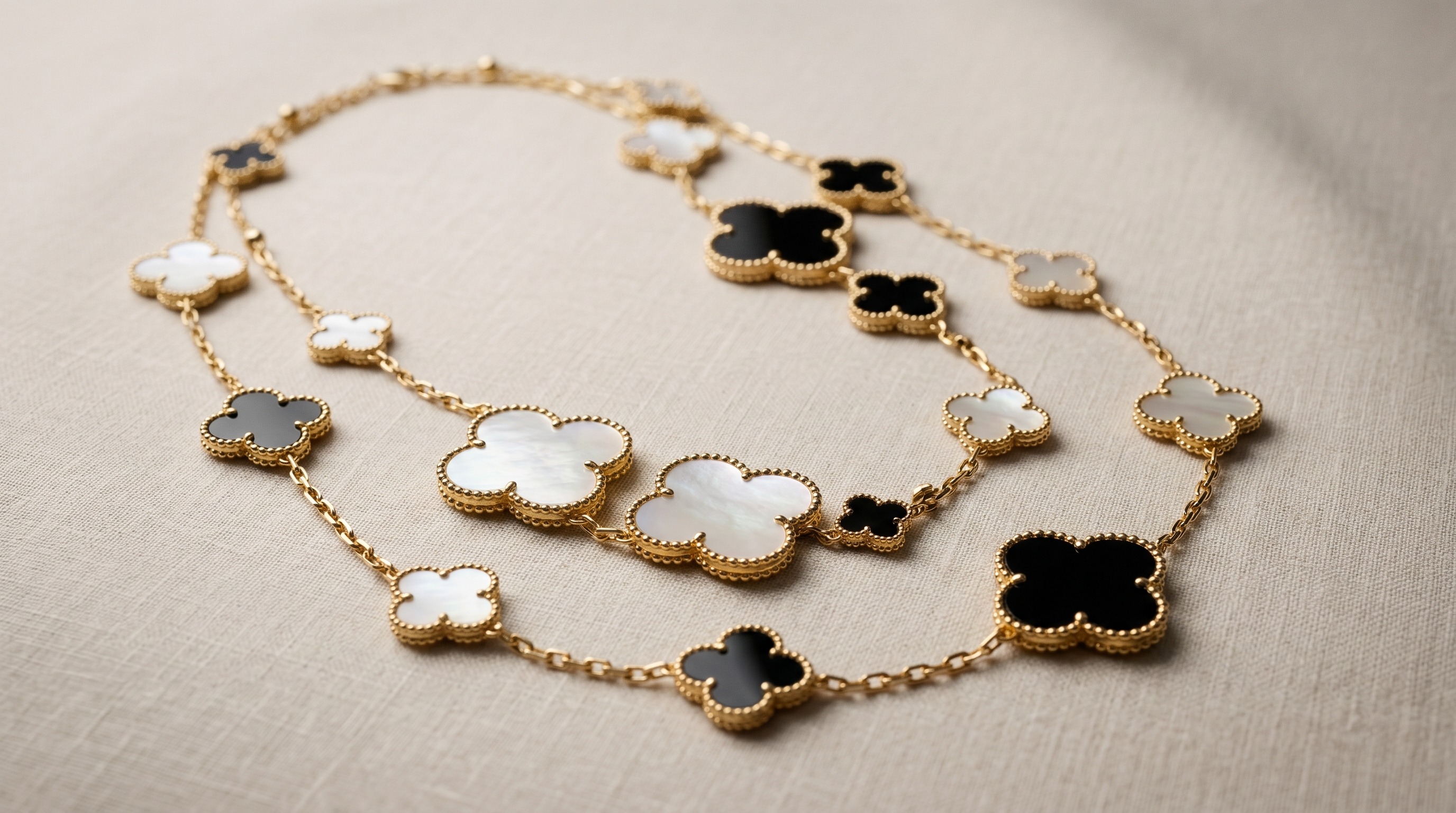 Van Cleef Magic Alhambra-style long necklace with mixed-size clover motifs — Mozeris Fine Antiques