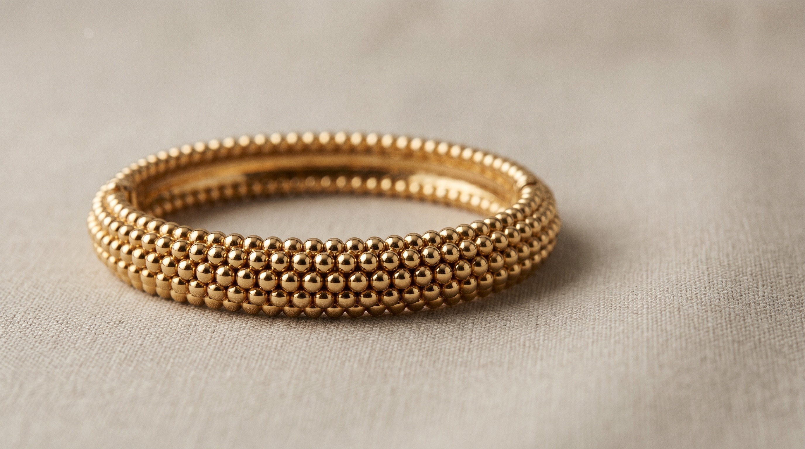 Van Cleef & Arpels Perlée-style gold beaded bangle — Mozeris Fine Antiques