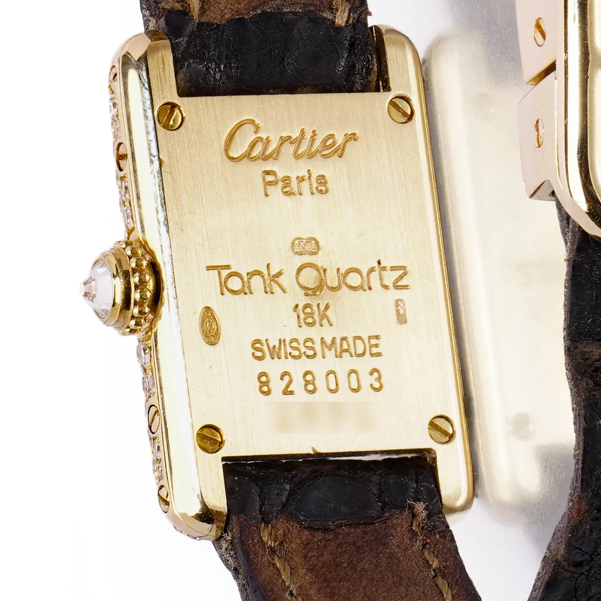 Cartier Paris Tank caseback with signature, 18K mark and serial