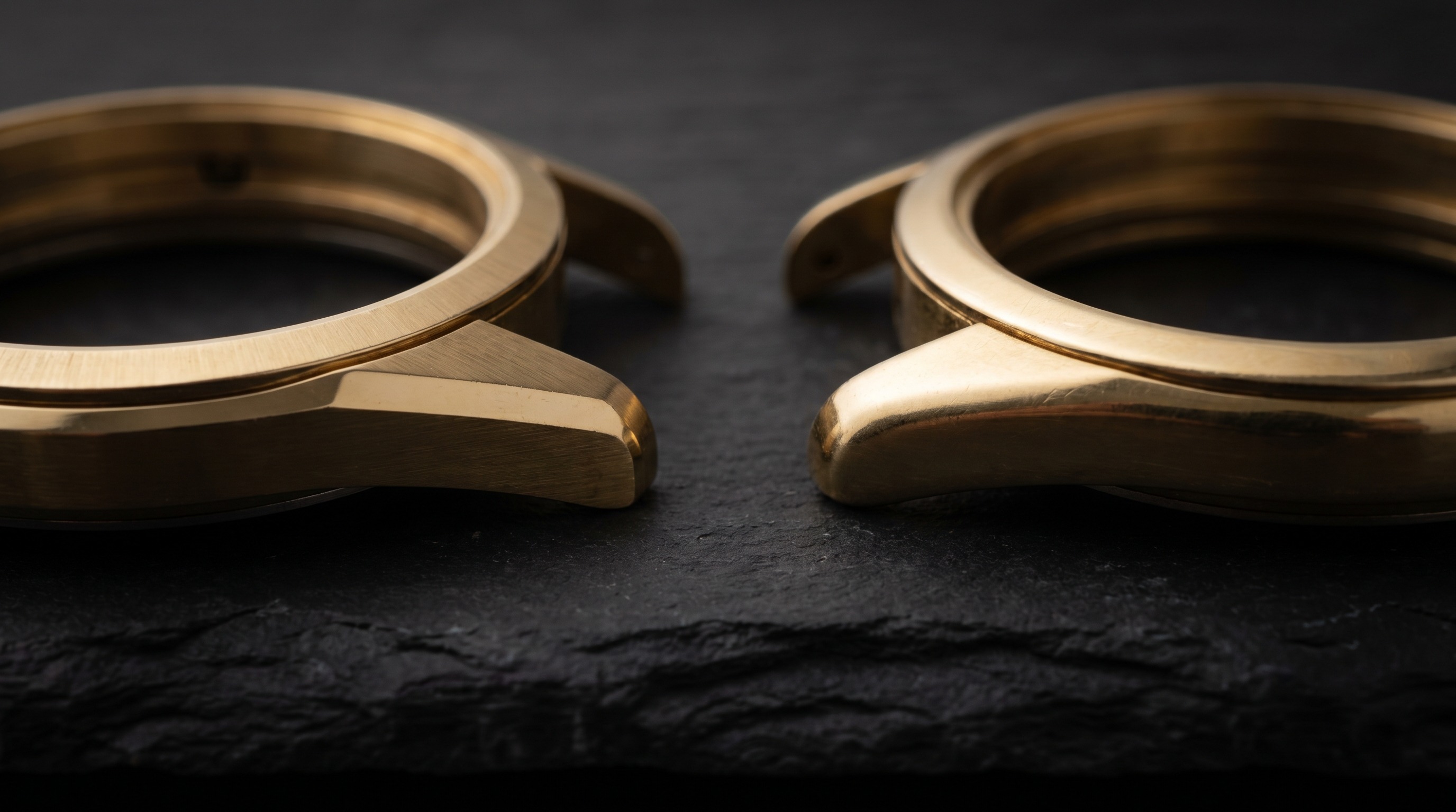 Comparison of a crisp unpolished gold watch case and an over-polished one with rounded edges